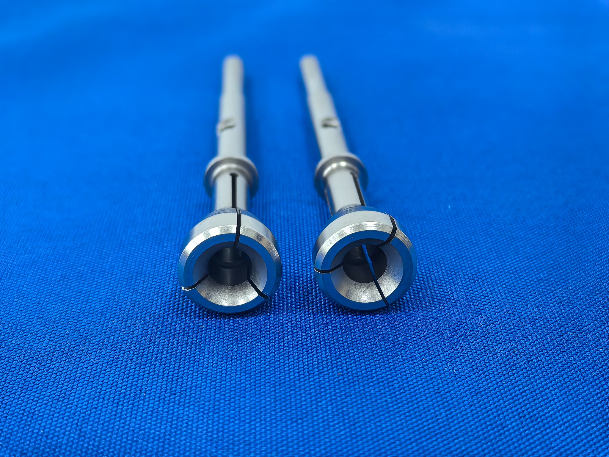 Precision metal components for grinding applications