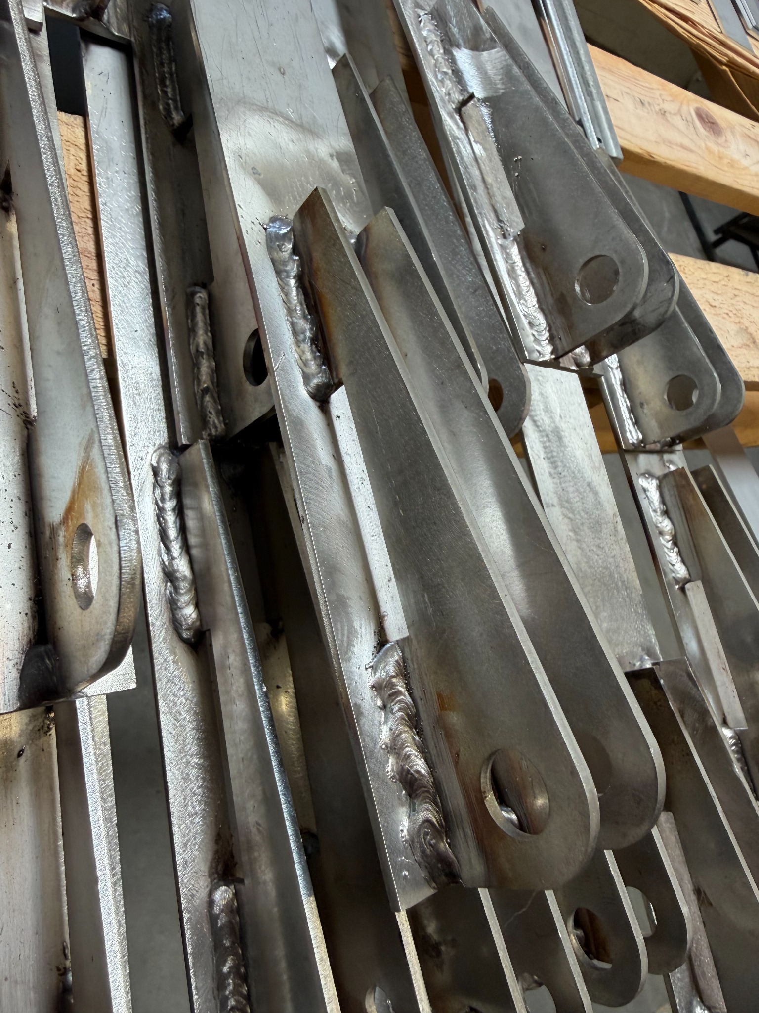 Close-up of welded sheet metal and fabricated attachment tabs