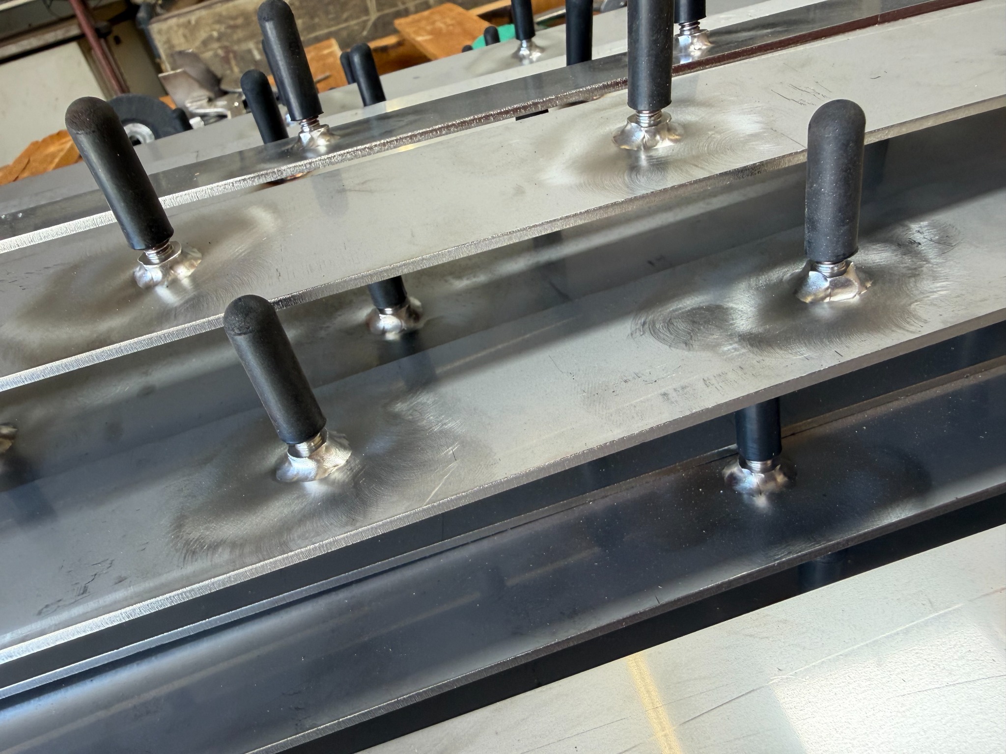 Fabricated metal components in process